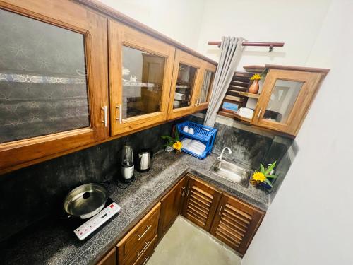 an overhead view of a kitchen with a sink at Navee Guest in Tangalle
