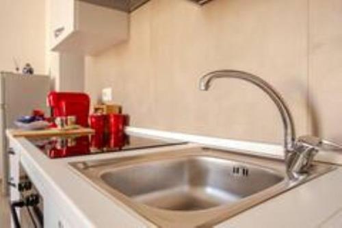 Η κουζίνα ή μικρή κουζίνα στο Giulia's Apartment