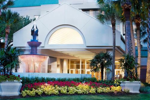 a building with a bunch of flowers in front of it at The Westin Hilton Head Island Resort & Spa in Hilton Head Island