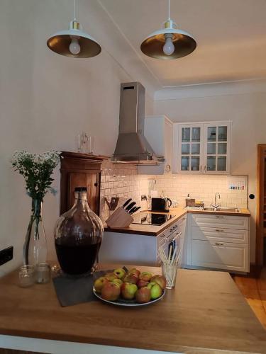 a kitchen with a plate of apples on a counter at Podenhaus in Bad Aussee
