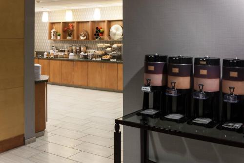 a room with a counter with aasteryasteryasteryasteryasteryasteryasteryasteryastery at SpringHill Suites by Marriott Boise ParkCenter in Boise