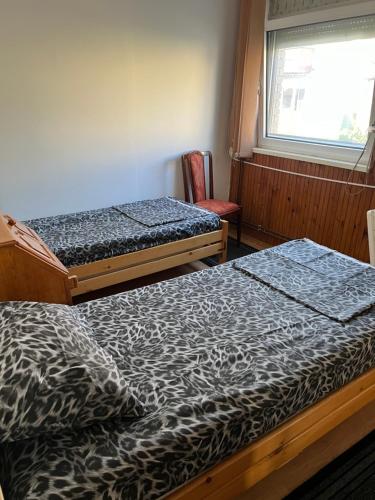 Ein Bett oder Betten in einem Zimmer der Unterkunft Slobo