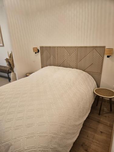 Postel nebo postele na pokoji v ubytování la chtite famille