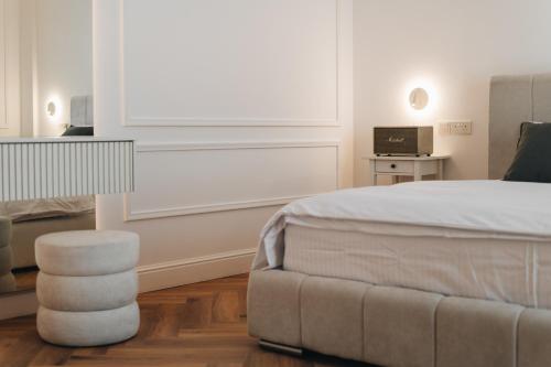 Ένα ή περισσότερα κρεβάτια σε δωμάτιο στο Hyperion Boutique Villa