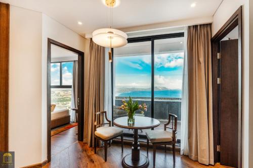 Ένα ή περισσότερα κρεβάτια σε δωμάτιο στο Apec Wyndham Luxe Escape Mui Ne