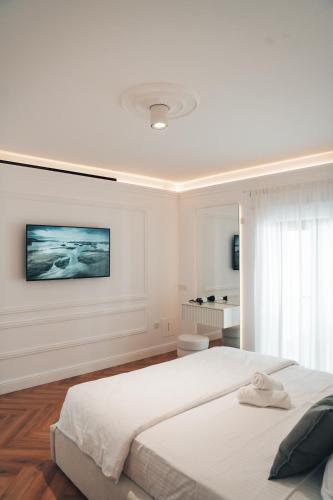 Ένα ή περισσότερα κρεβάτια σε δωμάτιο στο Hyperion Boutique Villa