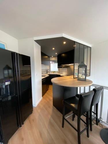 Photo de la galerie de l'établissement Duplex ensoleillé avec terrasse, à 300m de la plage, à La Baule