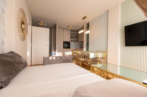 Postel nebo postele na pokoji v ubytování Apartman Platinum