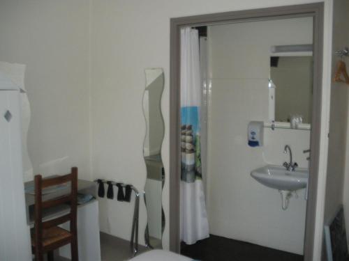 Koupelna v ubytování Hotel Du Port