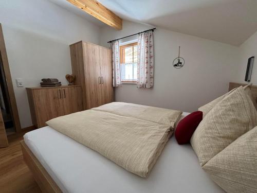 Posteľ alebo postele v izbe v ubytovaní Appartement Grubhof