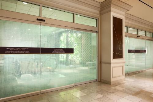 a display case in a building with glass at The Westin Galleria Houston in Houston