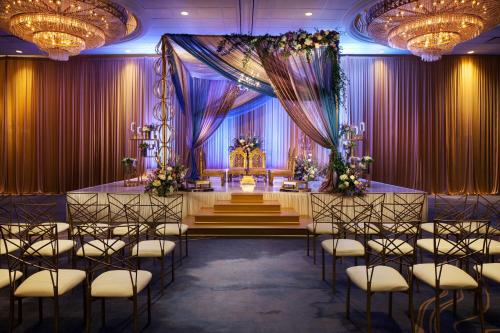 a set up for a wedding in a room with chairs at The Westin Galleria Houston in Houston