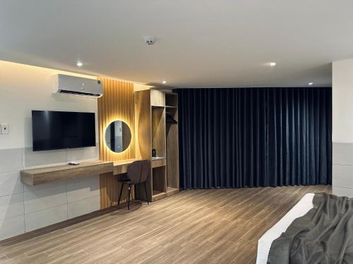 TV a/nebo společenská místnost v ubytování ON Hotel