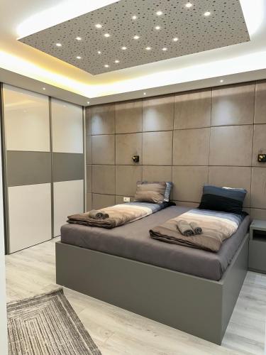 a bedroom with two beds in a room at Villa Luca Free Parking in Sarajevo