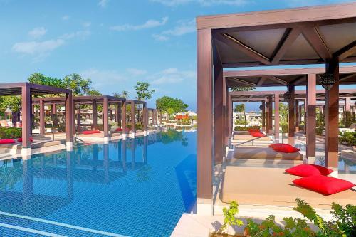 a rendering of a pool at a resort at W Muscat in Muscat