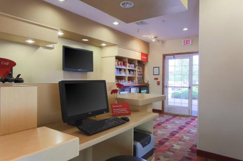 a computer sitting on a desk in a waiting room at TownePlace Suites Lubbock in Lubbock