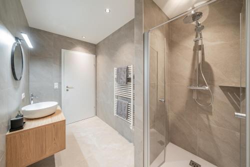 a bathroom with a shower and a sink at Apart Sonnenbichl in Sölden