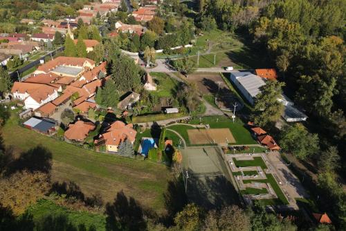 an aerial view of a house in a village at Rezort u Bobiho in Nový Tekov