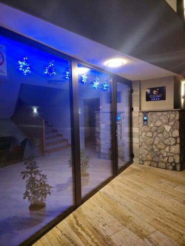 a room with a view of a room with blue lights at Orlovo gnezdo in Ljubovija