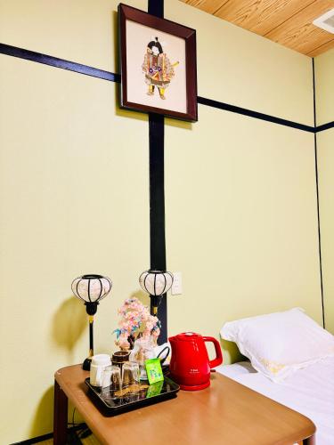 Cama o camas de una habitación en 大阪历史文化街区日式酒店 体验纯正和风生活 机场地铁直达
