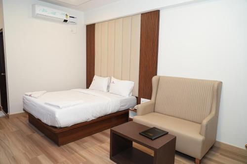 Una cama o camas en una habitación de Hotel Grand Sigma