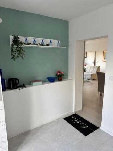 Postel nebo postele na pokoji v ubytování Ferienwohnung am Waldesrand