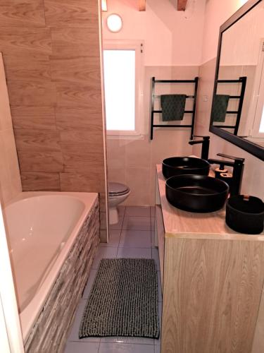 Kuchyň nebo kuchyňský kout v ubytování Cottage La Chaumière