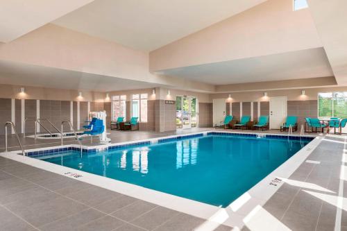 a large pool with blue water in a hotel room at Residence Inn by Marriott Wheeling/St. Clairsville in Saint Clairsville
