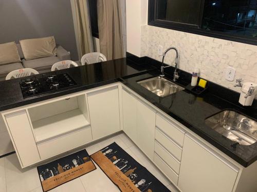 Nhà bếp/bếp nhỏ tại Res Leomarian 2 quartos Praia do Morro - Guarapari