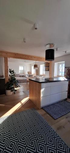 a kitchen with a counter top in a room at Anno 1763 in St. Wolfgang