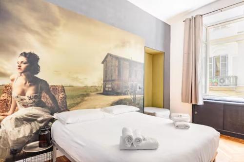 Postel nebo postele na pokoji v ubytování Apartments Chic Torino Centro porta nuova