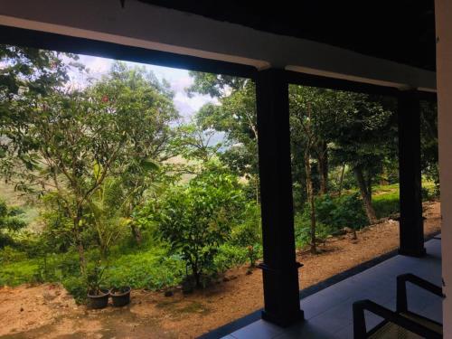 a view from the window of a house at Bracedale Estate in Kegalle