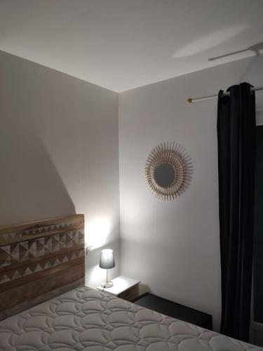 Postel nebo postele na pokoji v ubytování Villa Abbracciu climatisée avec piscine chauffée et vue mer