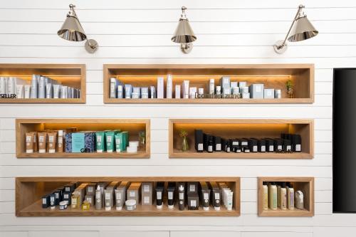 a wall of shelves filled with books at W Scottsdale in Scottsdale