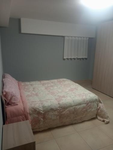 a bedroom with a bed in a room at LA MIA BELLA GRAVINa in Gravina in Puglia