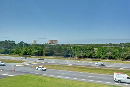 a highway with cars driving down a highway at TownePlace Suites by Marriott Panama City Beach Pier Park in Panama City Beach