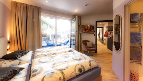 Ένα ή περισσότερα κρεβάτια σε δωμάτιο στο Appartement Lorenzi