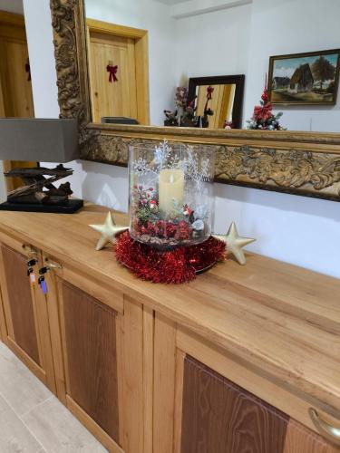 a candle on top of a counter in a room at Konak Lecic in TrÅ¡iÄ‡
