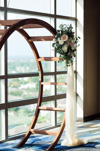 a vase with a bouquet of flowers on a chair at The Westin Tampa Bay in Tampa