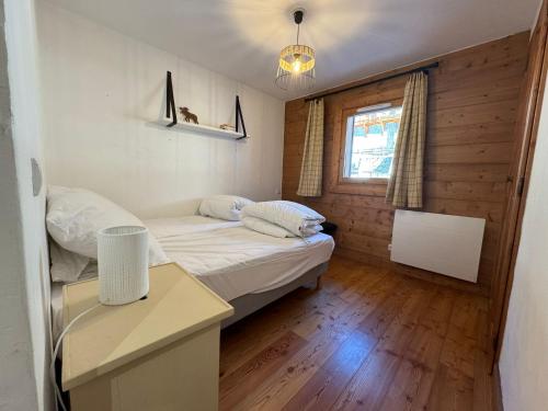 Katil atau katil-katil dalam bilik di Fermes St Foy F6 - Charmant 3 pièces, ski au pied - St Foy Tarentaise