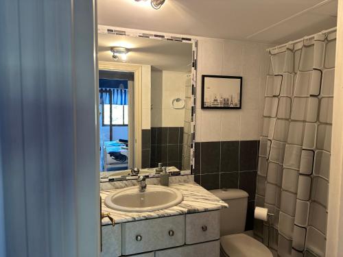 Apartamento bajo el gallo