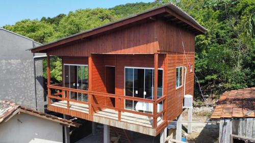 a house being constructed on top of a building at Pousada Buganvilia in Bombinhas