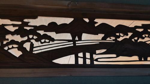 a close up of a wooden carving of a tree branch at Eastern sunrise home Valuable historical Japanese-style exclusive 4mins to ocean in Choshi