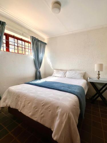 Ένα ή περισσότερα κρεβάτια σε δωμάτιο στο Katima Mountain View Lodge