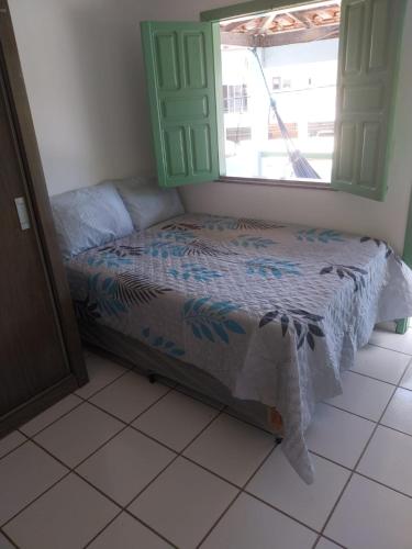 Katil atau katil-katil dalam bilik di Casa Ampla - 4 quartos e 3 banheiros