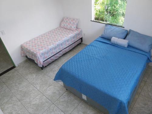 Katil atau katil-katil dalam bilik di Casa Ampla - 4 quartos e 3 banheiros