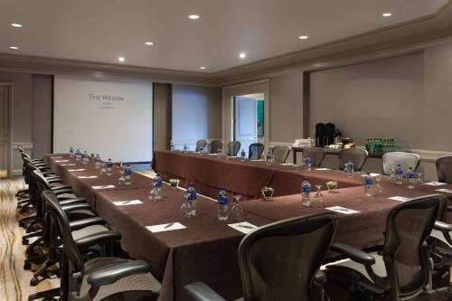 a conference room with a long table and chairs at The Westin Tampa Waterside in Tampa