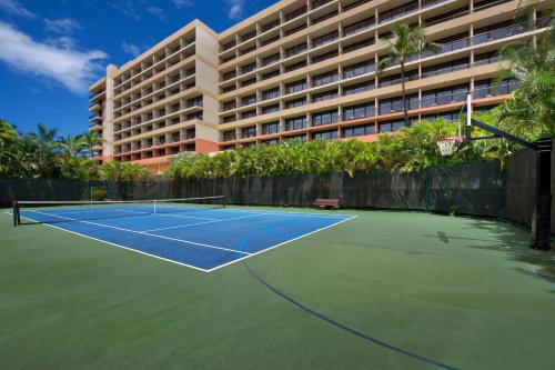 a tennis court in front of a building at Marriott's Maui Ocean Club - Lahaina & Napili Towers in Lahaina