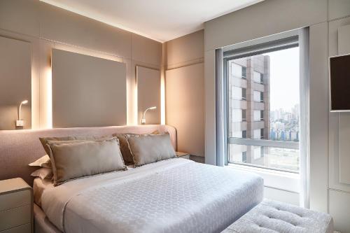 Postel nebo postele na pokoji v ubytování Sheraton São Paulo WTC Hotel