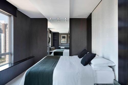 Postel nebo postele na pokoji v ubytování Sheraton São Paulo WTC Hotel